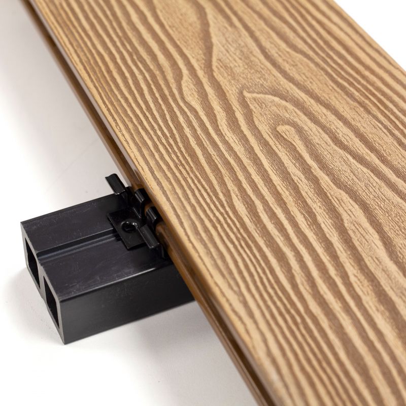 55555 - Decking Pro Close-up of a wood-grain panel attached to a black plastic mounting bracket/hinge fixture.